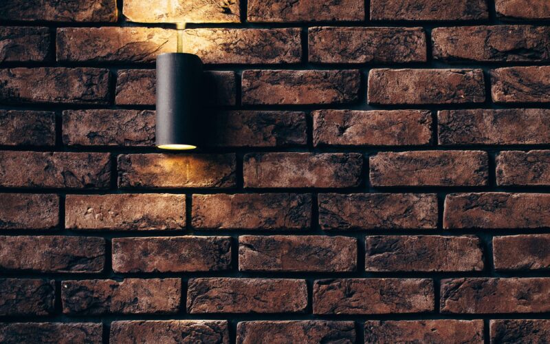Contemporary brick wall design featuring a sleek accent light.